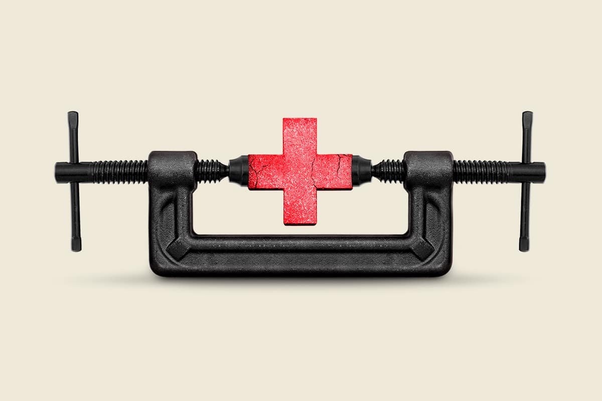 An illustration by Mariaelena Caputi showing a red medical cross damaged by the grip of a bench vice.